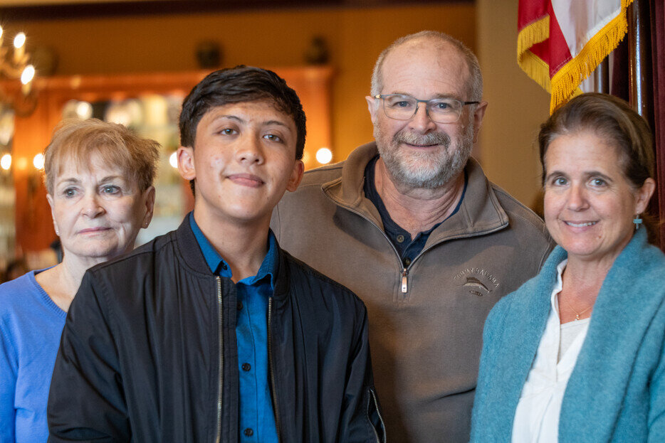 a group of people posing for a photo