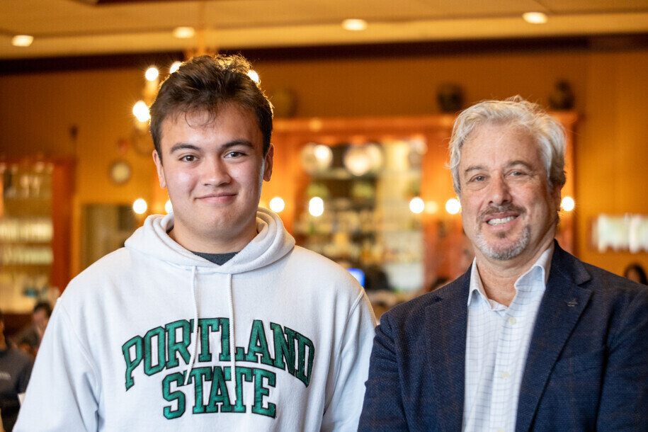 a man and a man smiling