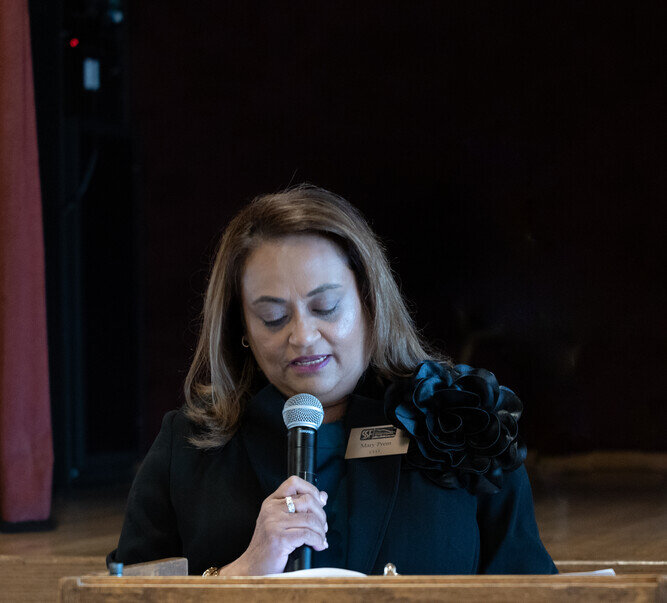 a woman holding a microphone