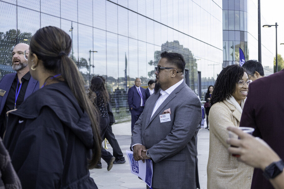 a group of people outside a building