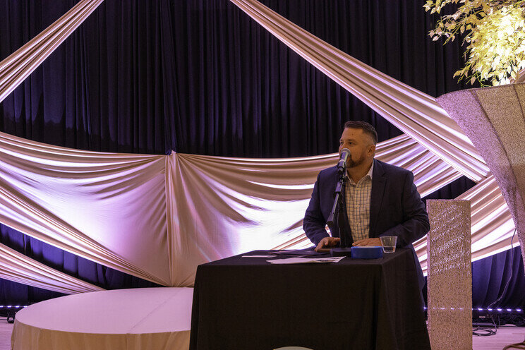 a man speaking into a microphone