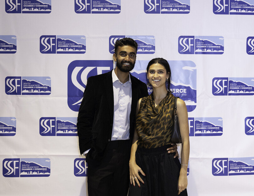 a man and woman posing for a picture