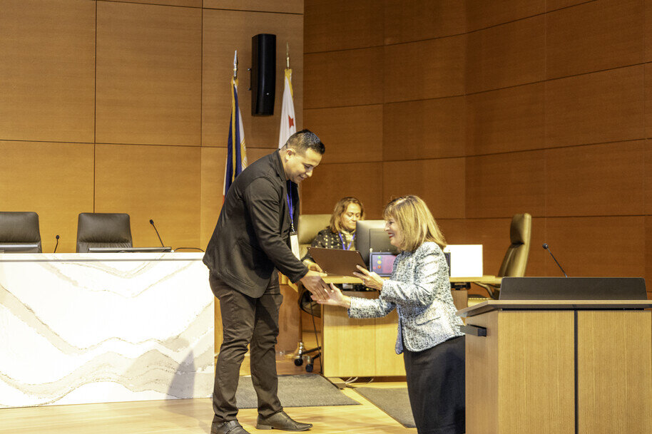 a man giving a woman a gift