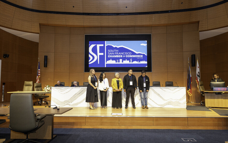 a group of people standing on a stage