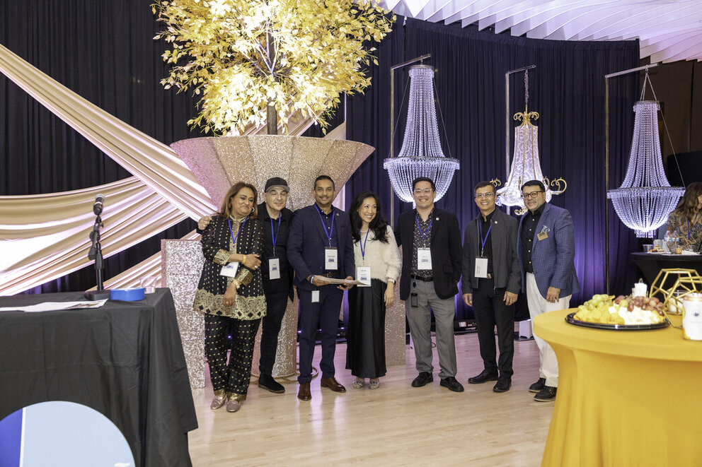a group of people posing for a photo